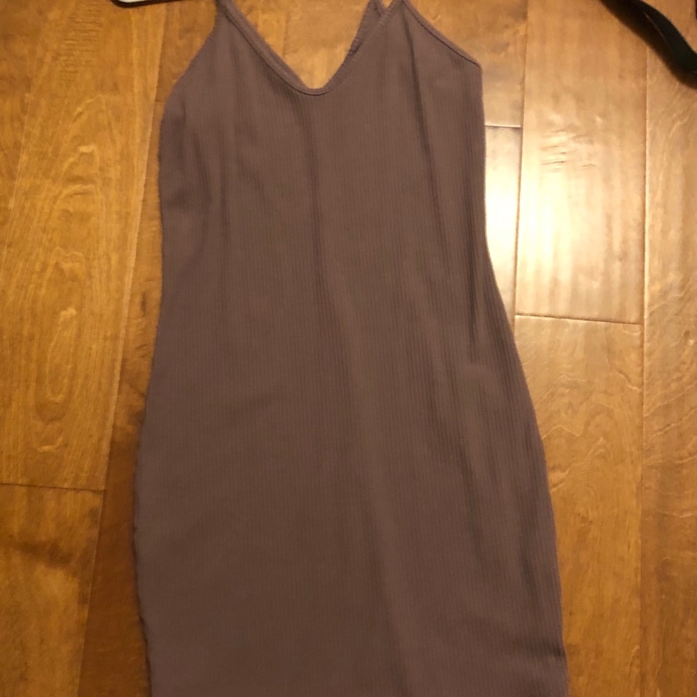 Light purple, form-fitting dress with a slight v